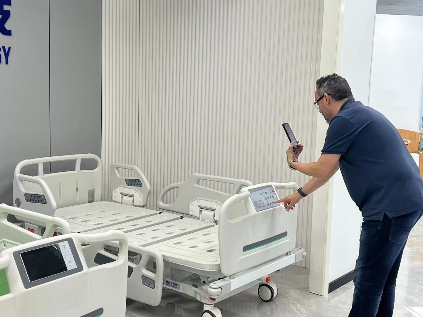 Customer testing a SHLION hospital bed