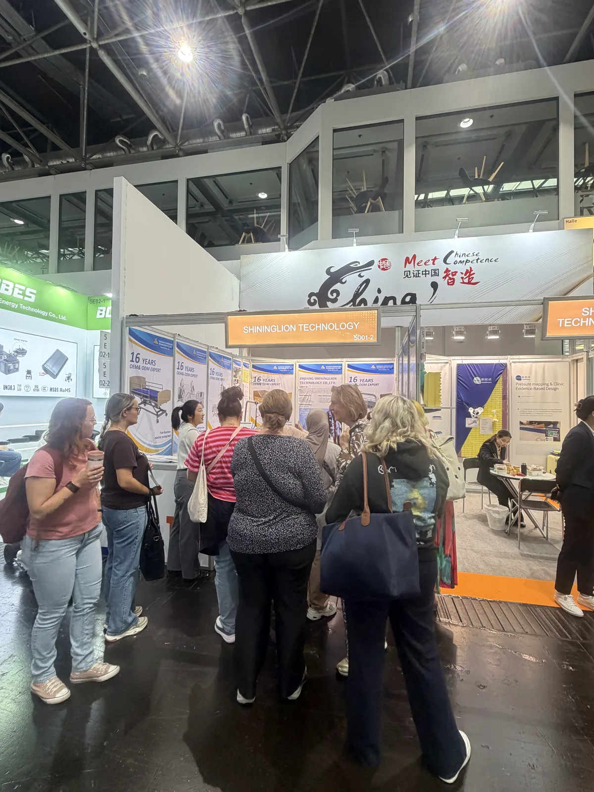 Busy visitor activity at the SHLION REHACARE booth